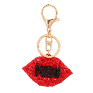 Portachiavi labbra con strass rossi e scritta KISS con moschettone in metallo dorato