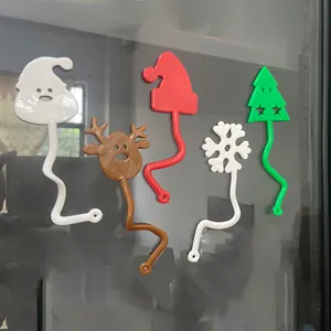 Weihnachts-Themen-TPR klebrige Spielzeuge Set mit Rentier, Schneeflocken und Weihnachtsmannmützen.