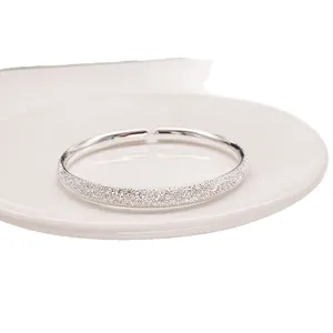 Elegant frosted silver-colored open bangle with starry sky texture for women