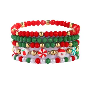 Set of 5 festive Christmas beaded bracelets featuring Santa Claus and candy cane charms for holidays