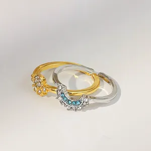 Ensemble de bagues élégantes soleil doré et lune argentée avec strass bleus et blancs
