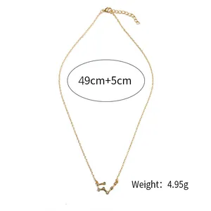 Detailed view of gold constellation necklace with 49cm length and zircon pendant