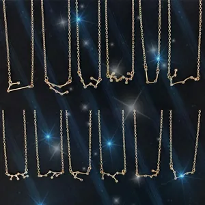 Collection of 12 unique zodiac constellation necklaces with glittering zircon pendants in gold