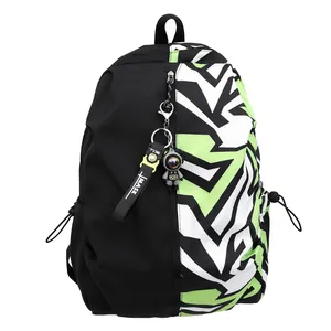 Large capacity school travel backpack featuring a split black and graffiti design with keychain