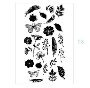Vintage nature themed clear silicone stamps featuring feathers flowers and butterflies