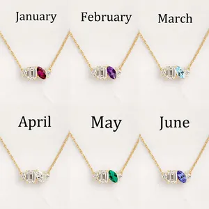 Detail of birthstone necklaces for January to June with gold chain and marquise gems