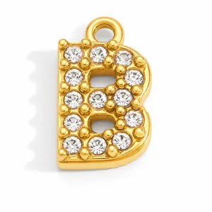 Close-up of gold-plated letter B pendant with sparkling clear crystals