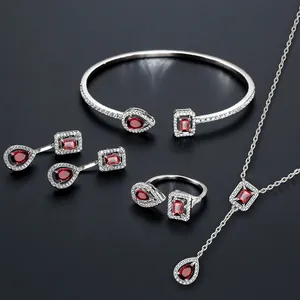 Elegant silver-tone jewelry set with red AAA zirconia teardrop and rectangle stones
