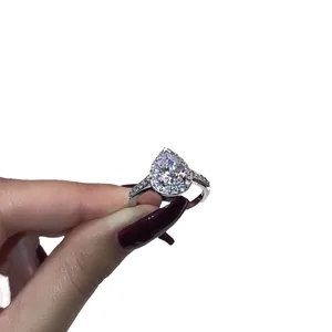 Elegant pear-shaped halo engagement ring for women with high-quality cubic zirconia stones