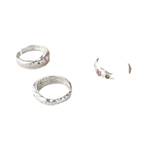Hammerschlag-Silberring im koreanischen Stil mit rosa Herz und grünen Steinen
