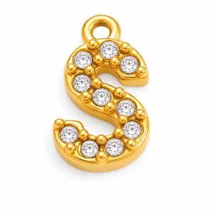 Close-up of gold plated stainless steel letter S pendant with full sparkling zircon inlay