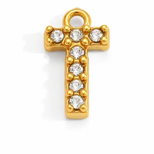Close-up of a gold-plated stainless steel letter T pendant with clear sparkling rhinestones