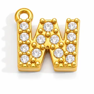 Detailed view of a gold-plated stainless steel letter W pendant with pave-set clear crystals