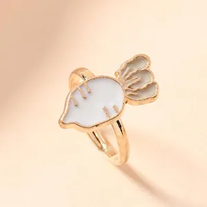 Gold-toned adjustable children's ring featuring a cute white enamel carrot design.