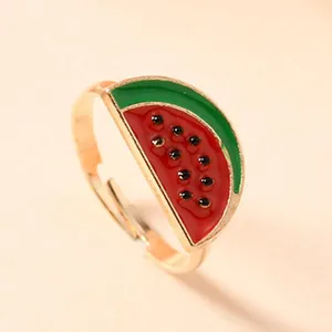Cute adjustable children's ring featuring a colorful enamel watermelon slice fruit design