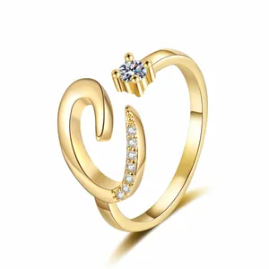Elegant gold adjustable ring with letter C design and sparkling zircon stone accents
