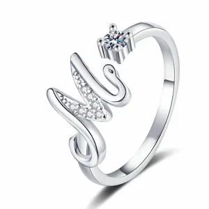 Detail view of a silver letter M adjustable ring with sparkling cubic zirconia accents.