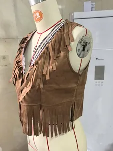 Close-up of women's vintage brown suede vest with layered fringe and boho trim