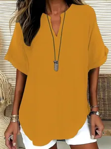 Stylish women's V-neck short sleeve top in mustard yellow for a casual spring look.