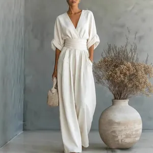 Elegant white V-neck high-waisted wide-leg jumpsuit for women in a chic minimalist style