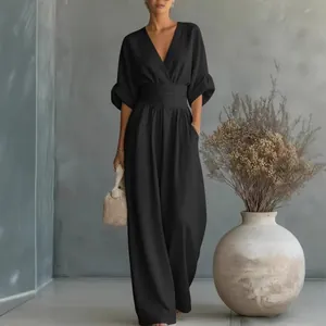 Elegant black V-neck wide leg jumpsuit with cinched waist for women spring summer style