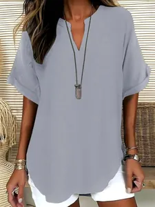 Detail view of a casual women's grey V-neck short-sleeve shirt with fabric texture.
