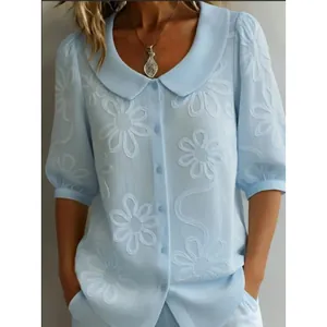 Light blue vintage Peter Pan collar short sleeve blouse with white floral embroidery patterns