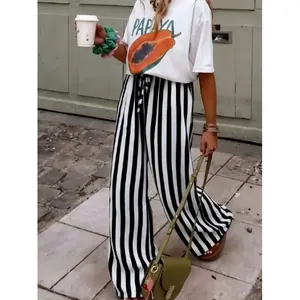 Pantaloni casual da donna a gamba larga con strisce verticali bianche e nere alla moda