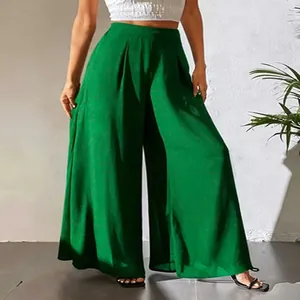 Pantalon large en mousseline verte élégante avec taille haute plissée pour femme