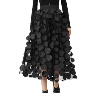 Detailed view of black high-waisted mesh A-line skirt with 3D floral petals