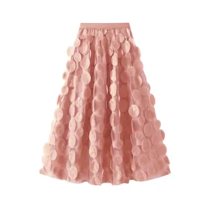 Detail showing the intricate 3D floral appliqués on this elegant pink mesh A-line skirt