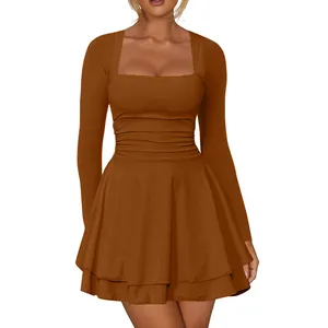 Detail of the square neckline and pleated waist of the brown mini party dress.