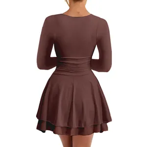 Back view of brown long sleeve ruched mini dress with double-layered ruffled hem
