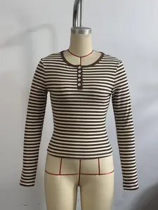 Brown and white striped long-sleeve T-shirt with button detail displayed on a mannequin