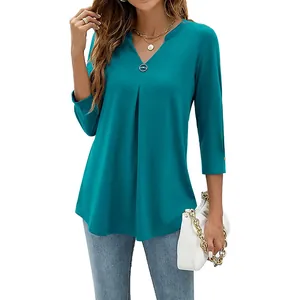 Elegant women's pleated V-neck 3/4 sleeve teal top with decorative ring detail.