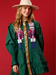 Festive Christmas green mini dress with sequined nutcracker embroidery and puff sleeves.