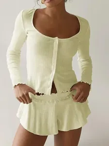 Elegant French style light green ribbed knit lounge set with ruffled shorts and button top