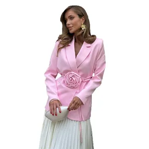 Elegant pink women's blazer with 3D rose decoration and waist tie on white background