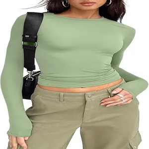 Detailed view of a women's slim-fit sage green long-sleeve crewneck T-shirt on a model