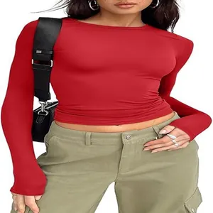 Macro view of red slim-fit crew neck long-sleeved T-shirt with comfortable fabric