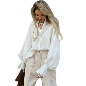 Elegant white loose fit long sleeve shirt for women with chic flared cuffs design