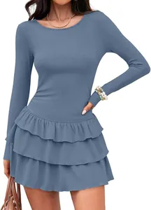 Detailed view of the blue long-sleeve knitted mini dress featuring tiered ruffle skirt