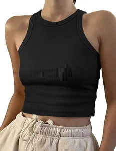 Detailed shot of a black ribbed crop tank top showing the slim fit and fabric texture