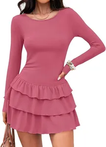 Detailed view of the dusty rose long sleeve ribbed knit dress with tiered ruffle hem.