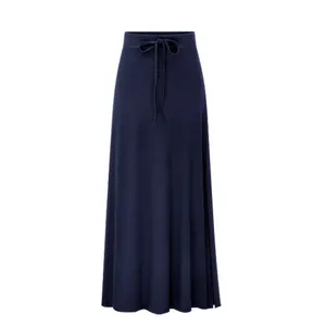 Elegant navy blue high-waisted knitted midi skirt featuring a side slit and drawstring