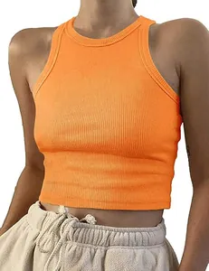 Close-up of vibrant orange ribbed slim fit sleeveless crop tank top worn by model