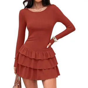 Long sleeve knitted tiered ruffle dress with round neck and slim fit in elegant rust color