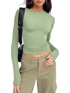 Professional studio shot of a slim fit sage green crew neck long sleeve t-shirt for women