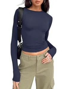 Slim fit solid navy blue long sleeve crewneck t-shirt for women in trendy casual style
