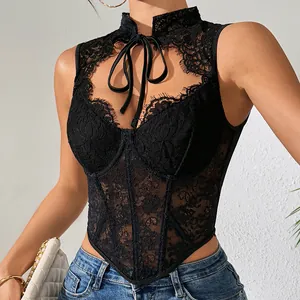 Detailed view of a black lace corset top featuring fishbone structure and cutout.